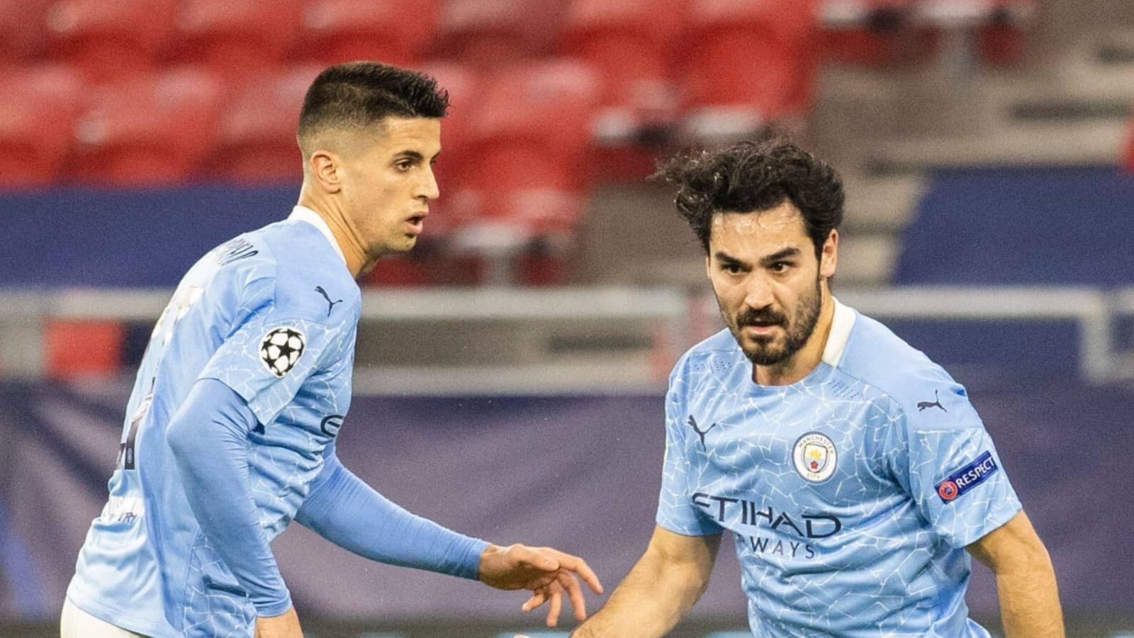 joao-cancelo-and-ilkay-gundogan-represent-man-city-1692579225.jpg