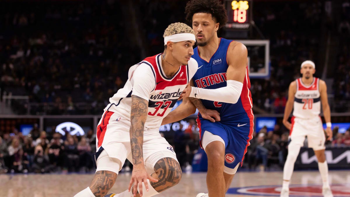 washington-wizards-forward-kyle-kuzma-33-drives-to-the-basket-next-to-detroit-pistons-guard-cade-cunningham-2-during-the-second-half-at-little-caesars-arena-1701518207.jpg