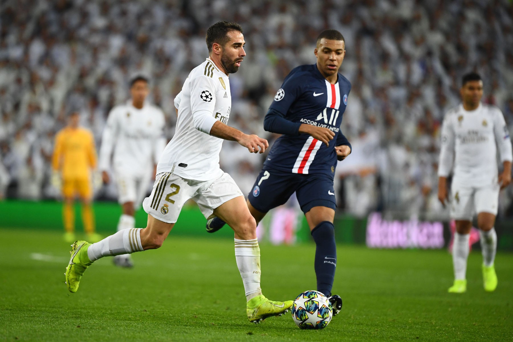 dani-carvajal-and-kylian-mbappe-real-madrid-vs-psg-champions-league-2019-1710930645.jpg