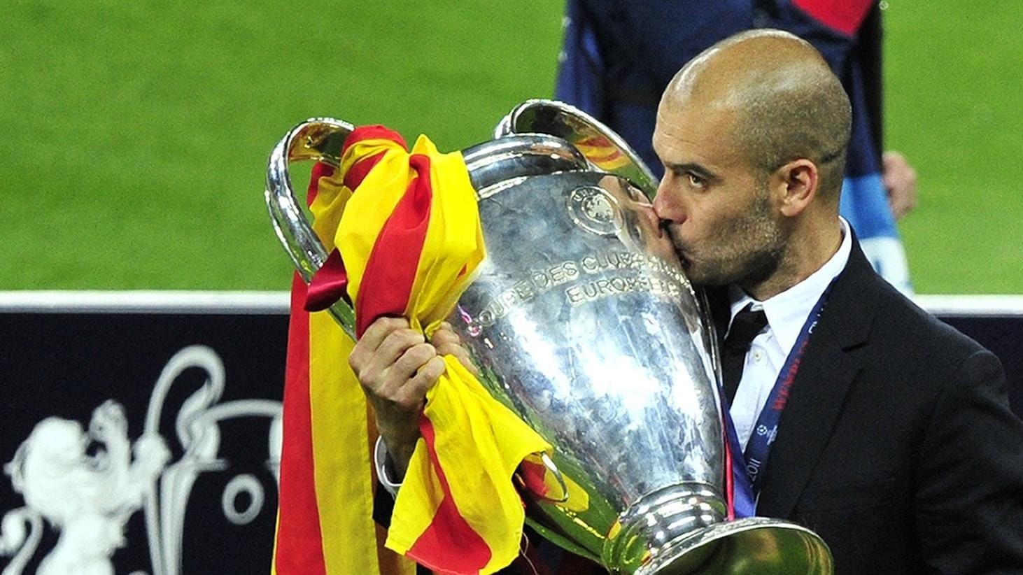 barcelona-coach-josep-guardiola-holds-the-european-cup-at-wembley-1718025866.jpeg