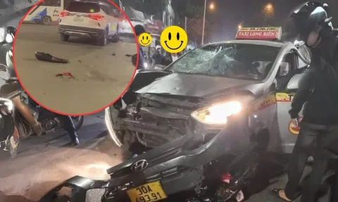 Hà Nội: Taxi ‘điên’ đâm trọng thương hai người đang dừng đèn đỏ