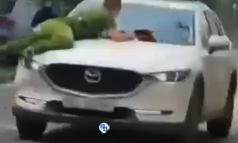 Phẫn nộ với tài xế xe SUV hất công an lên nắp capo rồi phóng bạt mạng