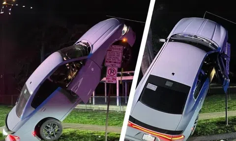 Tài xế say xỉn điều khiển ô tô ‘treo lơ lửng’ trên biển báo giao thông